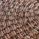 Round coffee table in braided cord and rattan, 1970.
