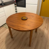 Wooden round table with butterfly extension from the 1970s.