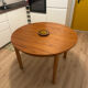 Wooden round table with butterfly extension from the 1970s.