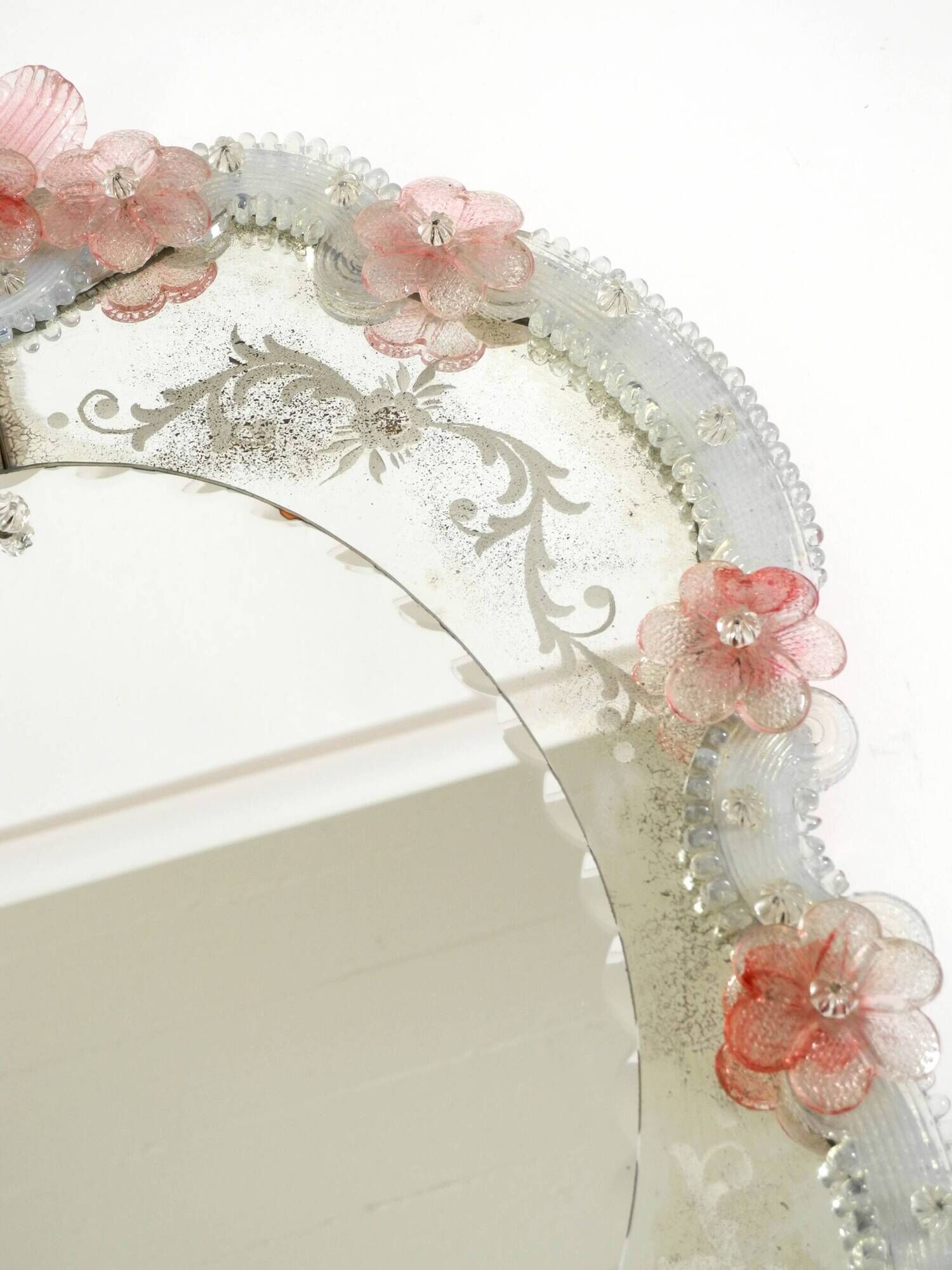 Italian mid-century wall mirror with a Murano glass frame and blossoms
