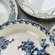 6 green and blue mismatched iron earth plates