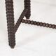 Wooden table legs in coils