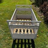 Vintage wicker bed with casters from the 50s in perfect condition