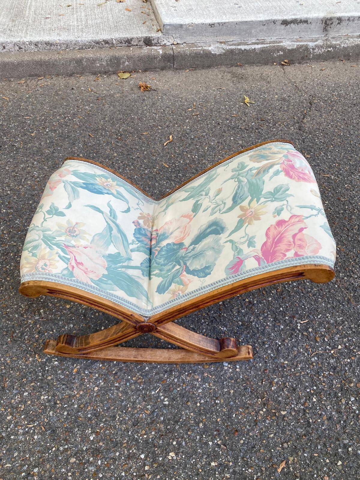 Kneeling prayer desk with rocking footrest in solid wood, curule style & floral fabric.