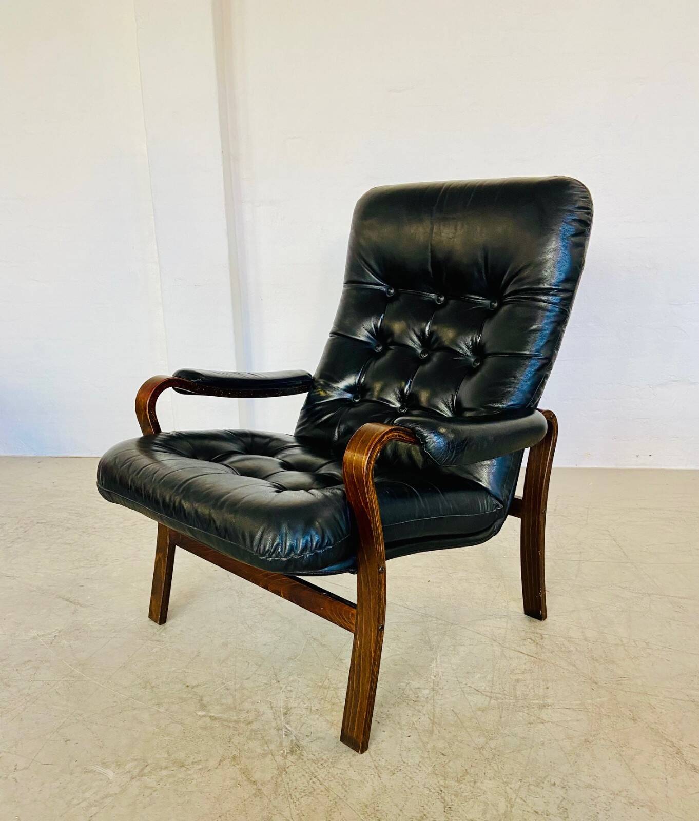 Vintage mid-century Scandinavian black leather lounge chair 1970s