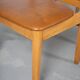 Set of 6 Danish dining chairs made of beech and brown leatherette.