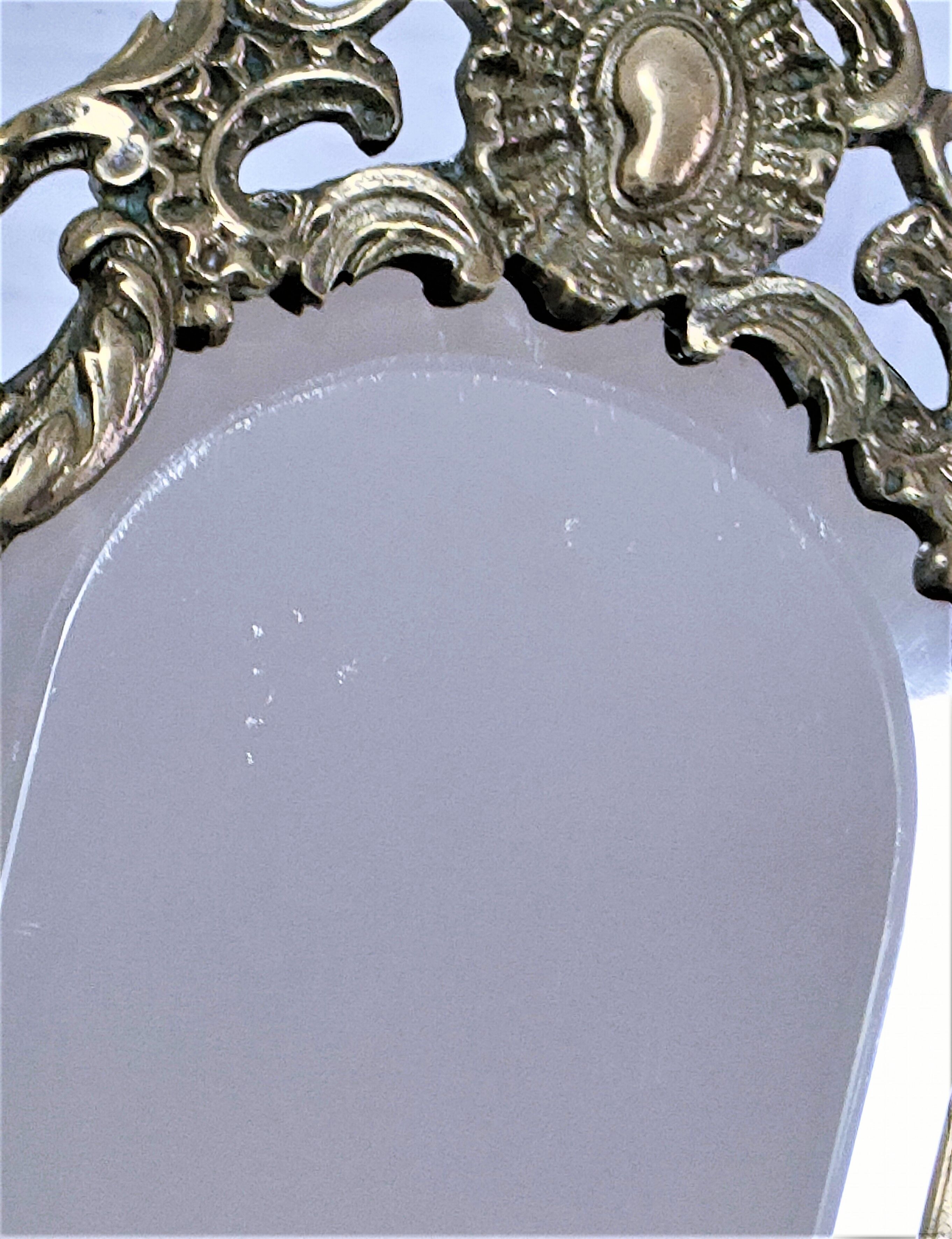 Patinated bronze chandelier mirror early twentieth century