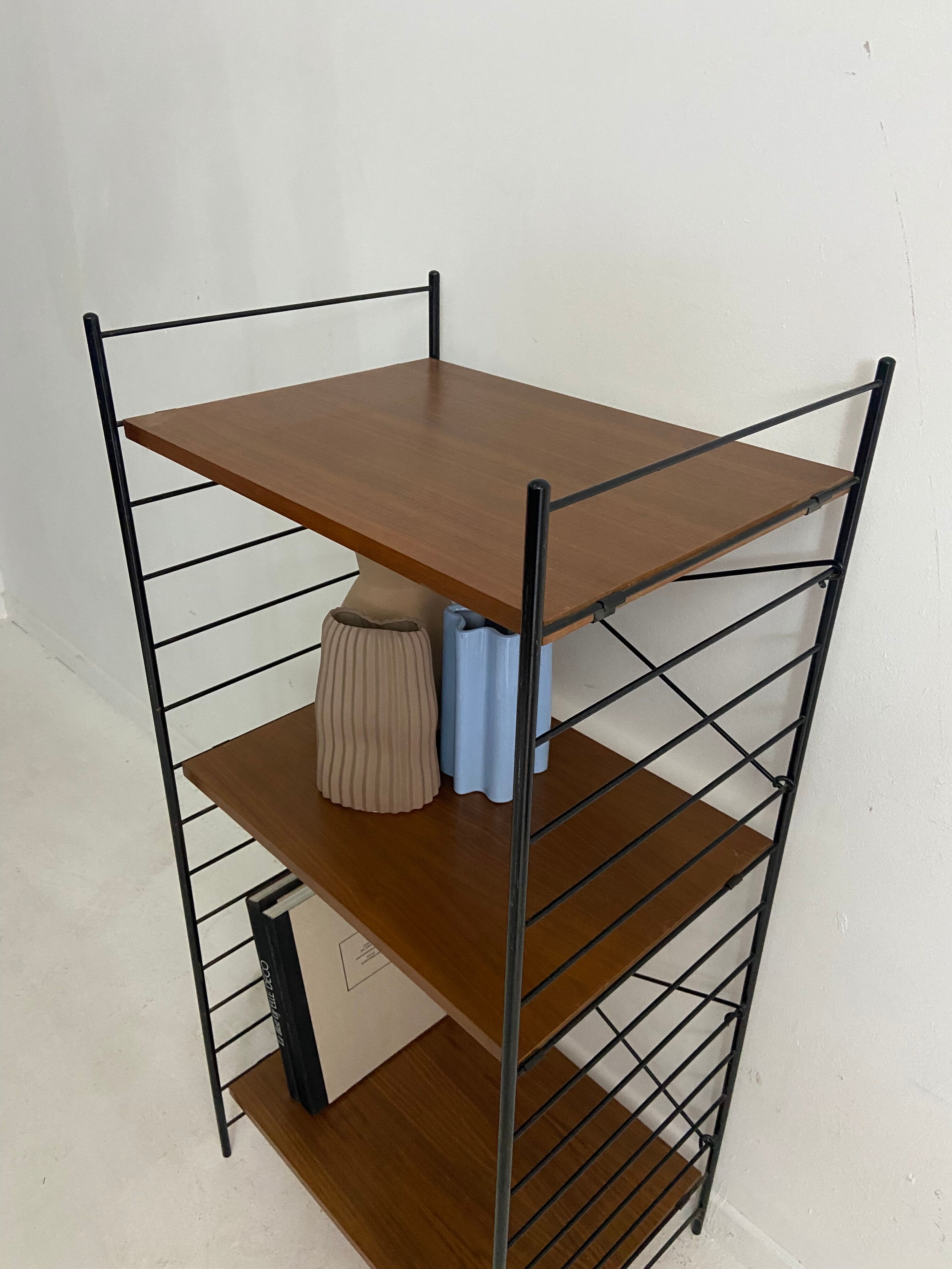 small vintage metal and teak string bookshelf