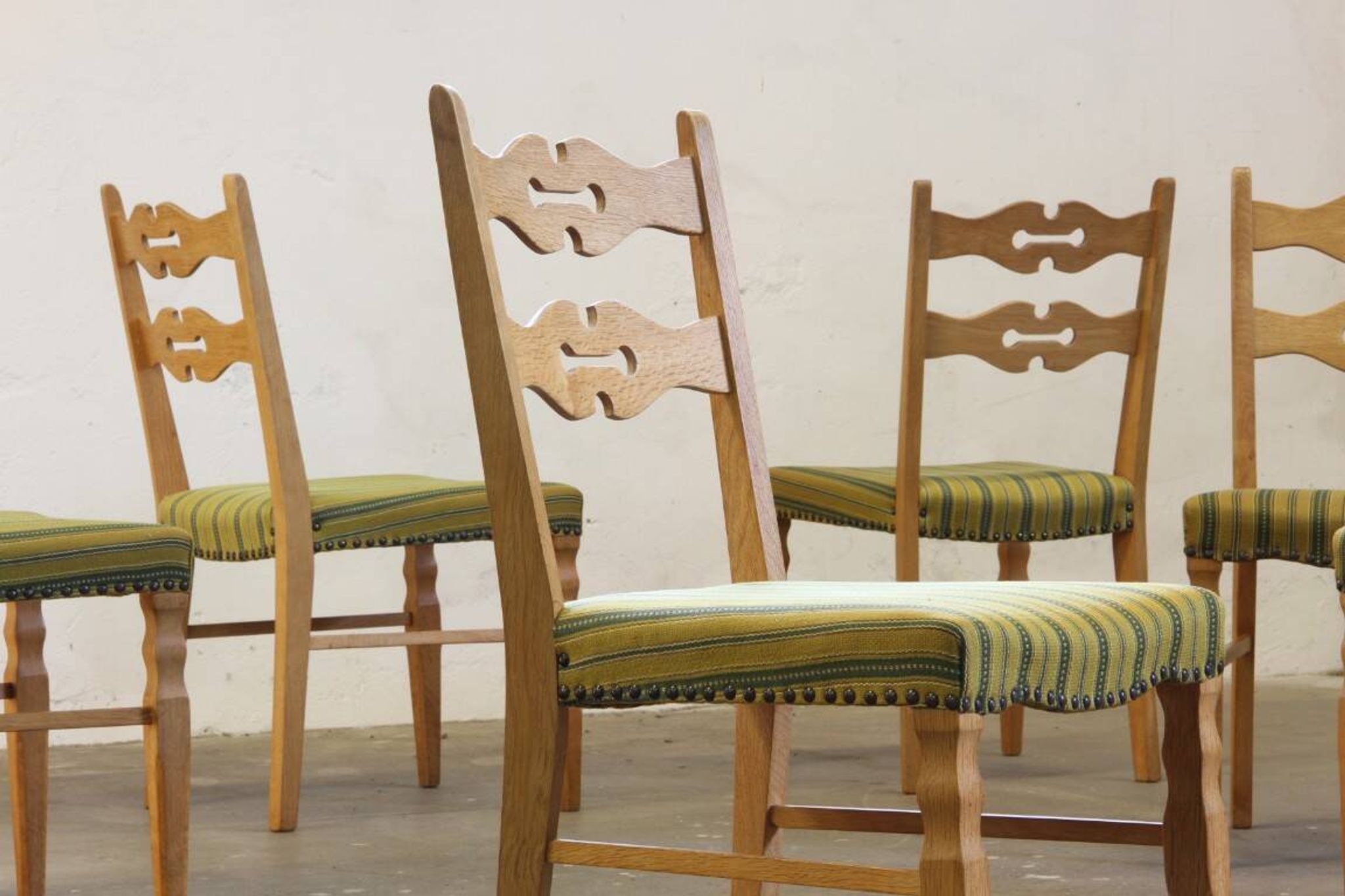 Vintage 1960s brutalist Danish modern oak dining chairs in the style of Henning Kjærnulf