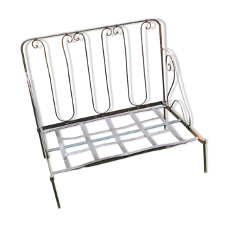 Former seat in iron with its cushions