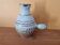 Joel Baudouin in Durtal - Jug in red stoneware decorated with leaves