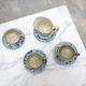 Series of 3 cups, a milk jar and 4 antique porcelain saucers