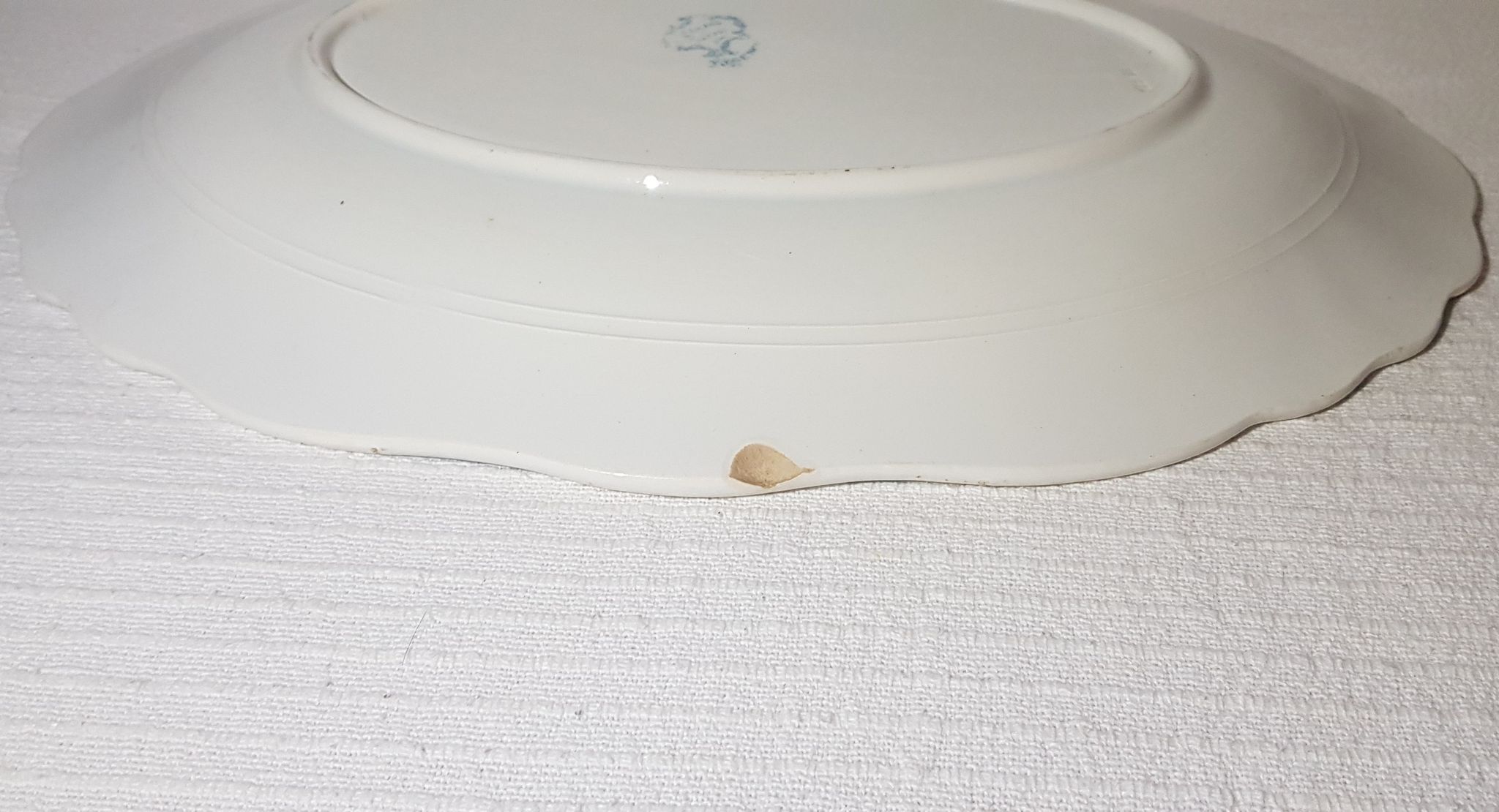 Oval dish of the earthenware factory of St amand Regency model, iron earth