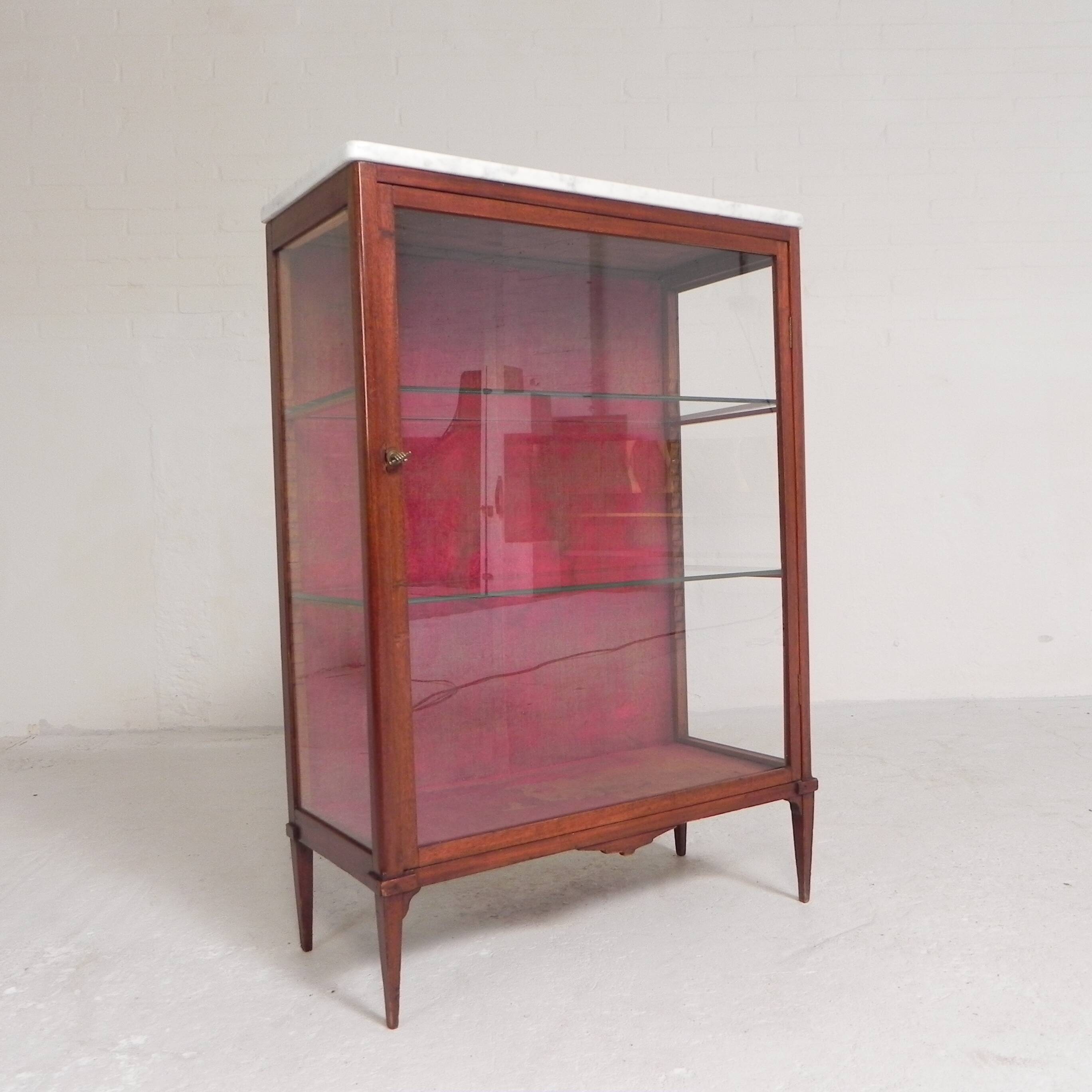 Mahogany display cabinet with marble top, 1920s