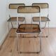 Trio de chaises pliantes en plexiglas