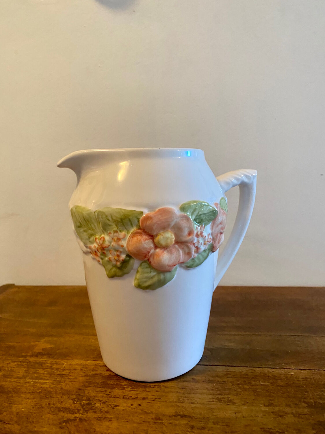 Pretty peach colored flower carafe