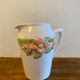 Pretty peach colored flower carafe