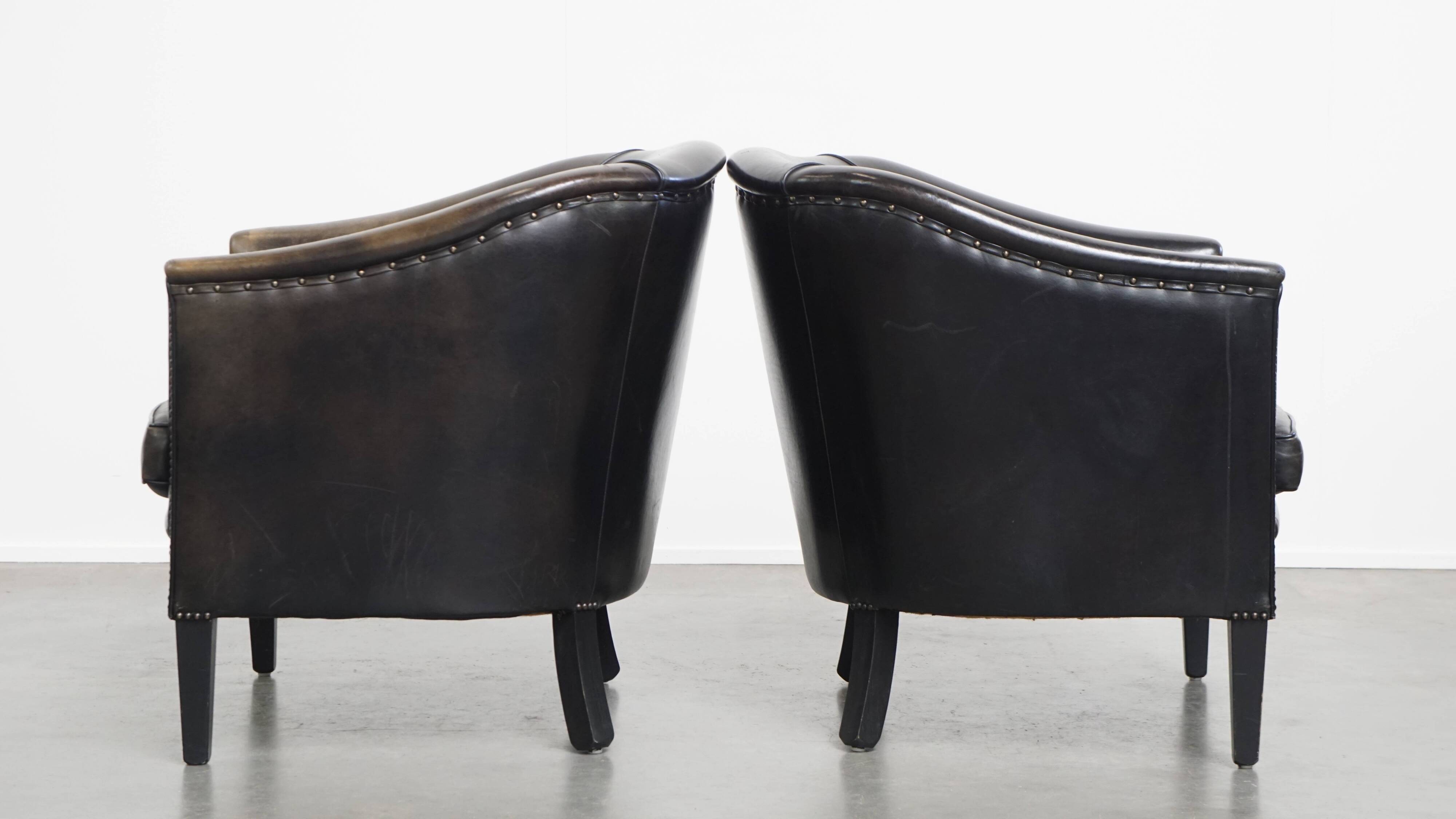 Set of 2  black/grey sheepskin leather club chairs
