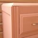Pretty vintage salmon chest of drawers.