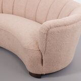 Danish curved banana sofa in a powder pink wool fabric, 1940s