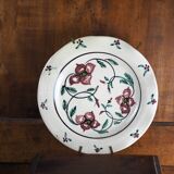 Meyssac plate decorated with flowers on cracked background early twentieth century and its support