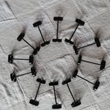 Set of 12 black twisted wrought iron knife holders from the 50s