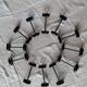 Set of 12 black twisted wrought iron knife holders from the 50s