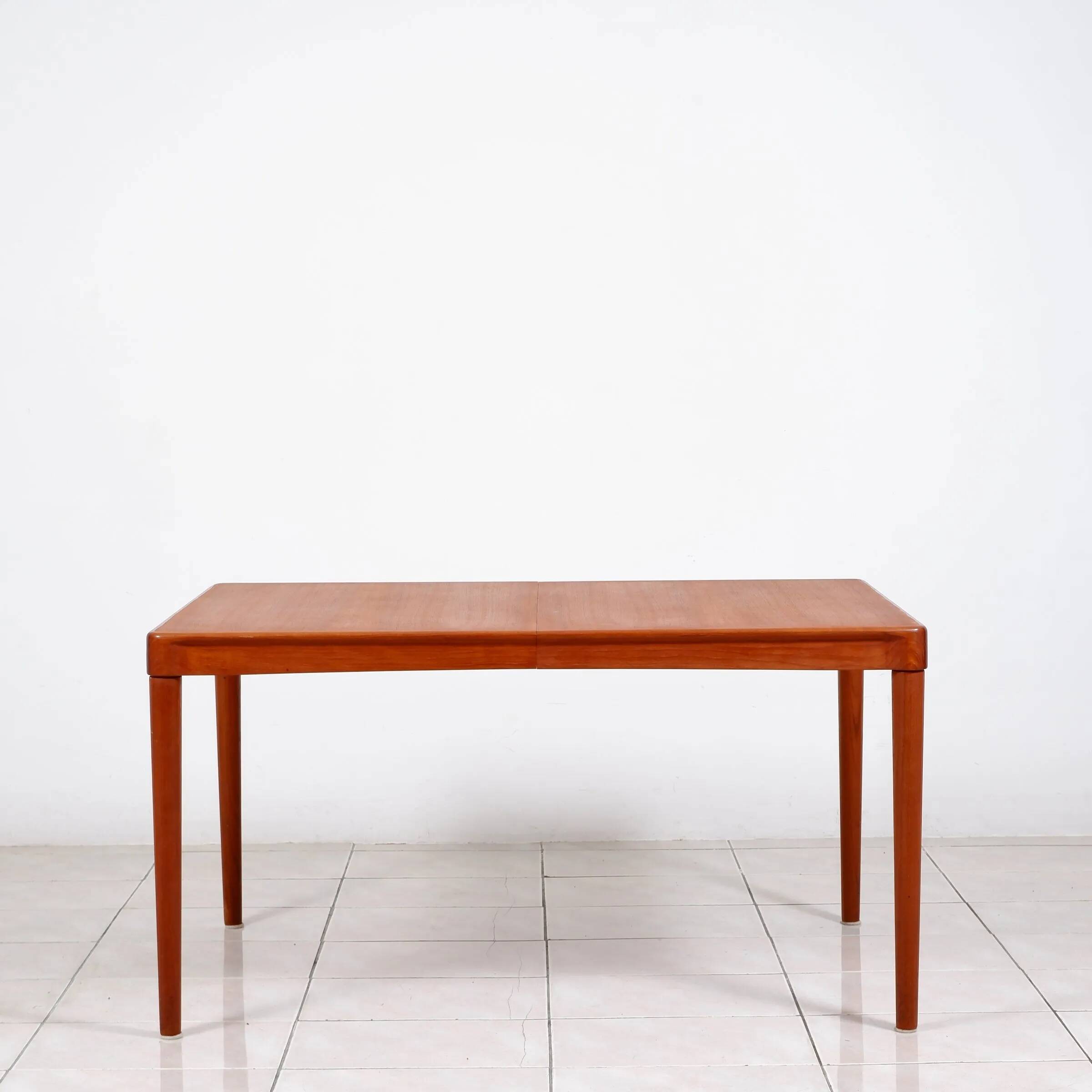 Extendable dining table in teak by H. W. Klein for Bramin Mobler