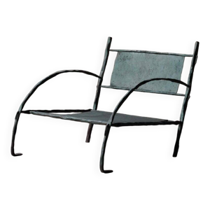 Fauteuil bas en fer forgé