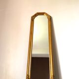 Old slim golden mirror