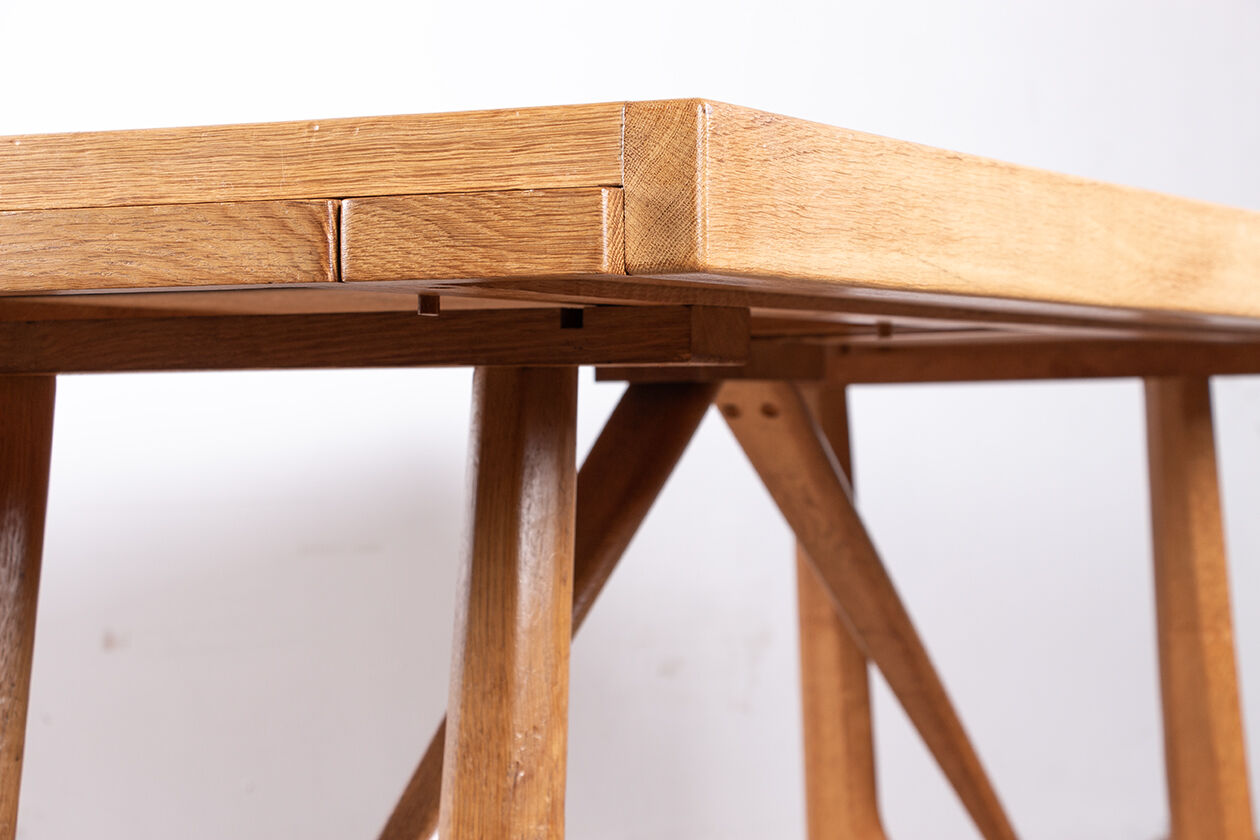 Large extendable dining table in oak by Guillerme and Chambron 1960.