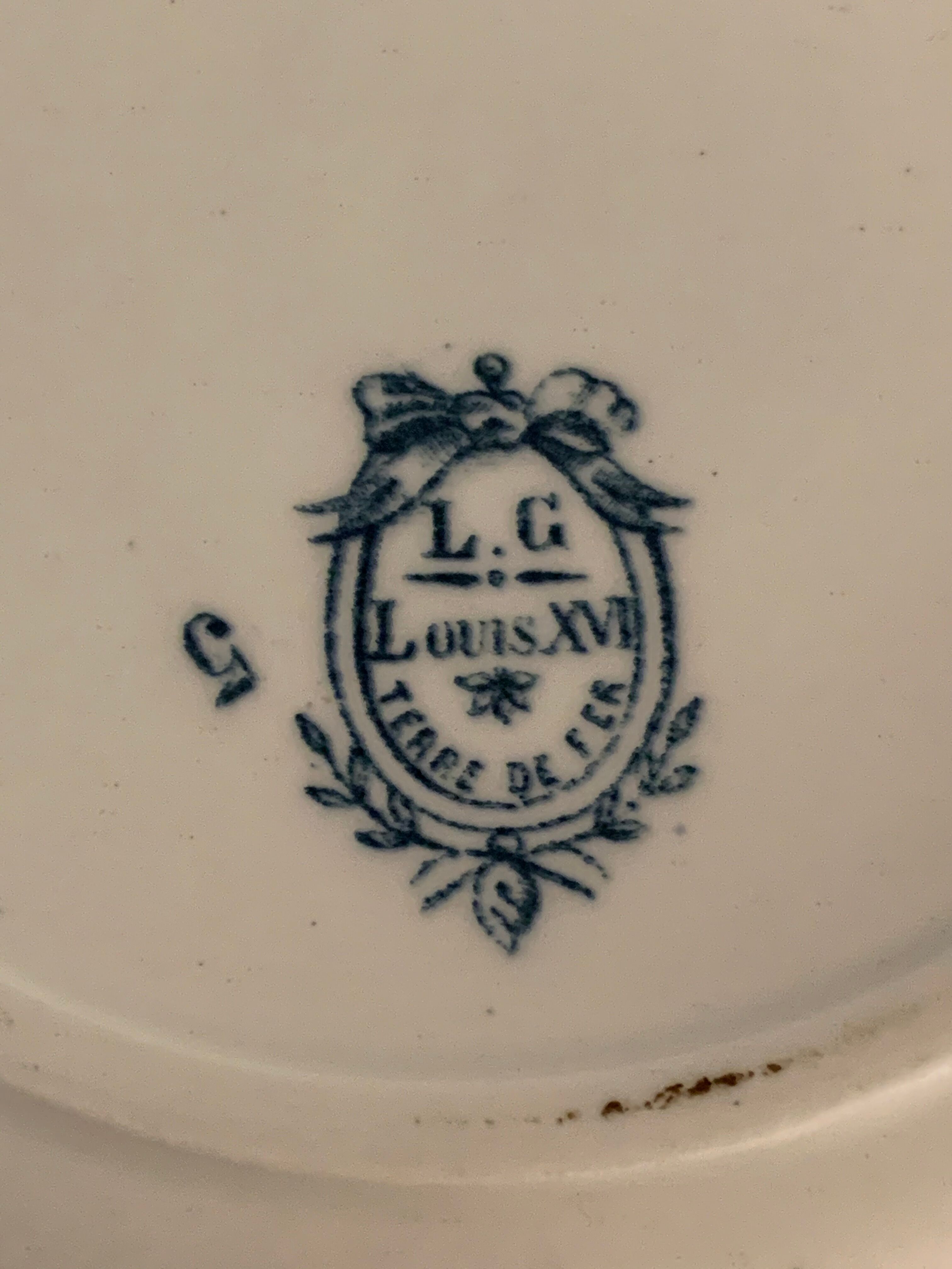 10 old blue flat plates Terre de Fer Léon Graves model Louis XVI, twentieth century