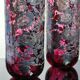 Paire de vases Laugharne avec revêtement en argent, en verre soufflé à la main de couleur rubis marbré.