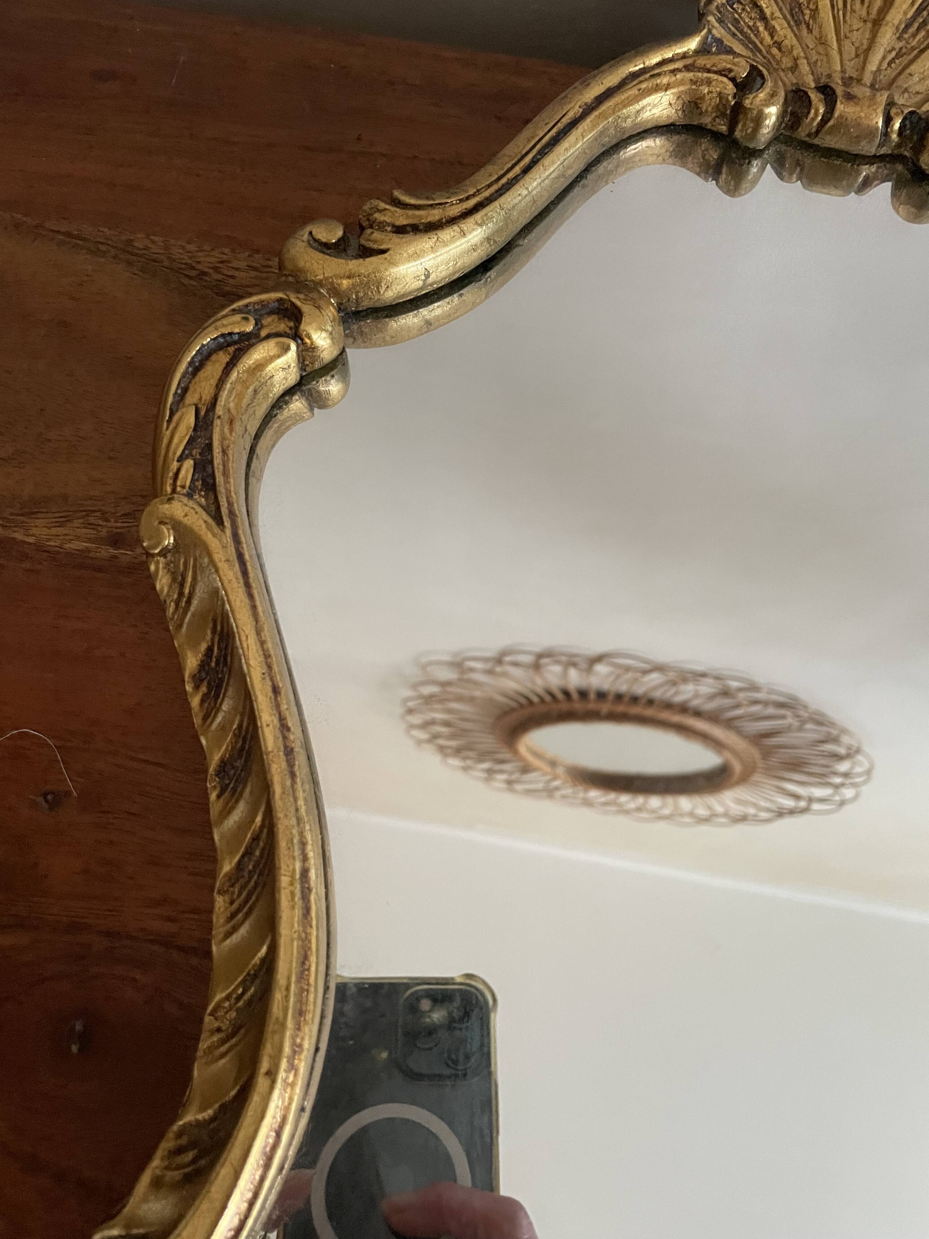 Baroque style mirror in gilded wood