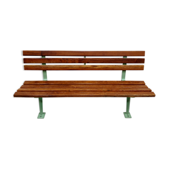 Restored and varnished garden bench in hardwood and olive green metal