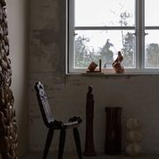 Sculpted wooden tripod chair in French Wabi Sabi, early 20th century.