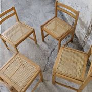 Série de 4 chaises vintage en pin assise cannage