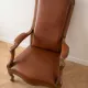 Classic vintage armchair in brown leather and oak