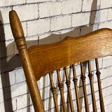 Wooden armchair with high back