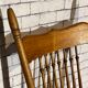 Wooden armchair with high back
