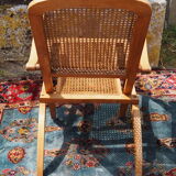 Cane folding armchair in solid wood