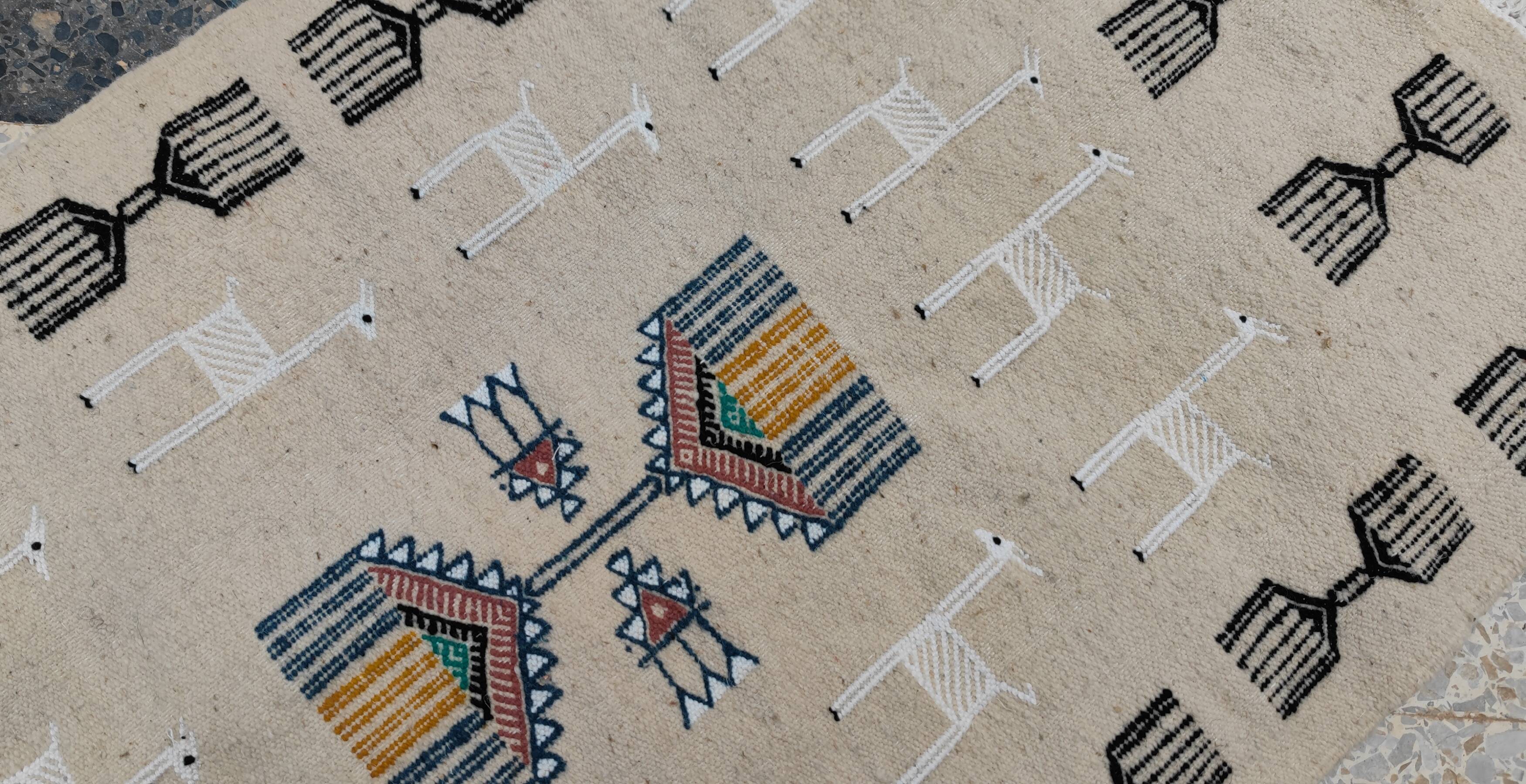 Handwoven kilim rug in natural wool