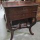 Dresser or vanity table from the Charles X / Empire period in mottled mahogany.