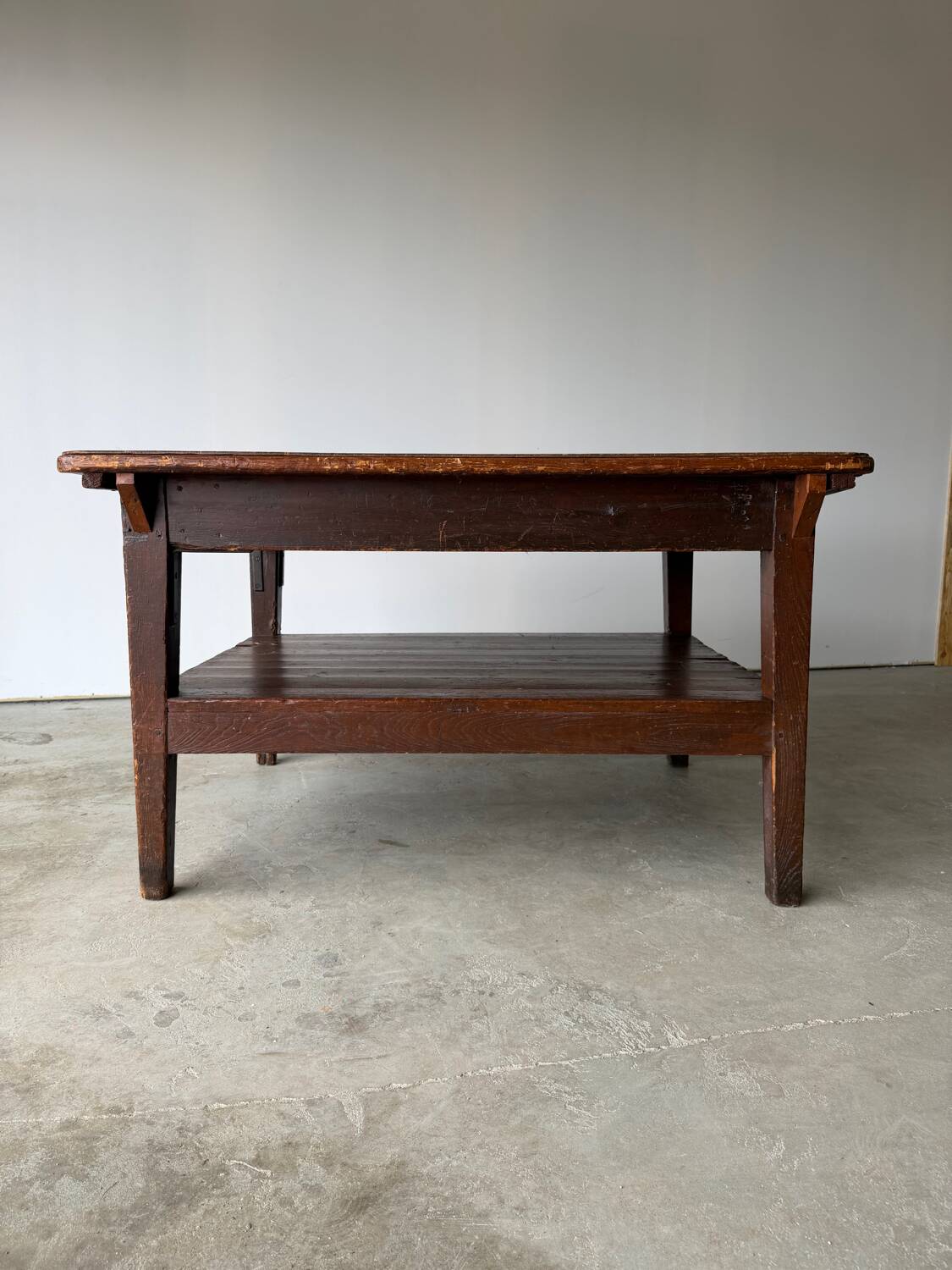 Antique draper's workbench / haberdashery table in solid wood from the early 20th century.