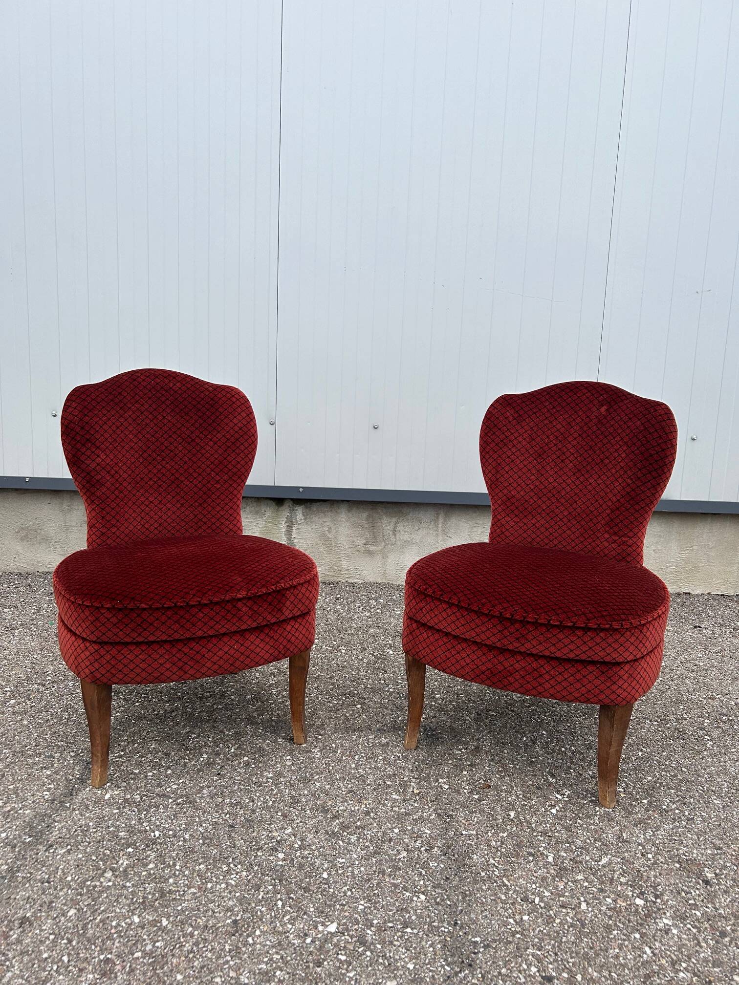 pair of red velvet toad armchairs