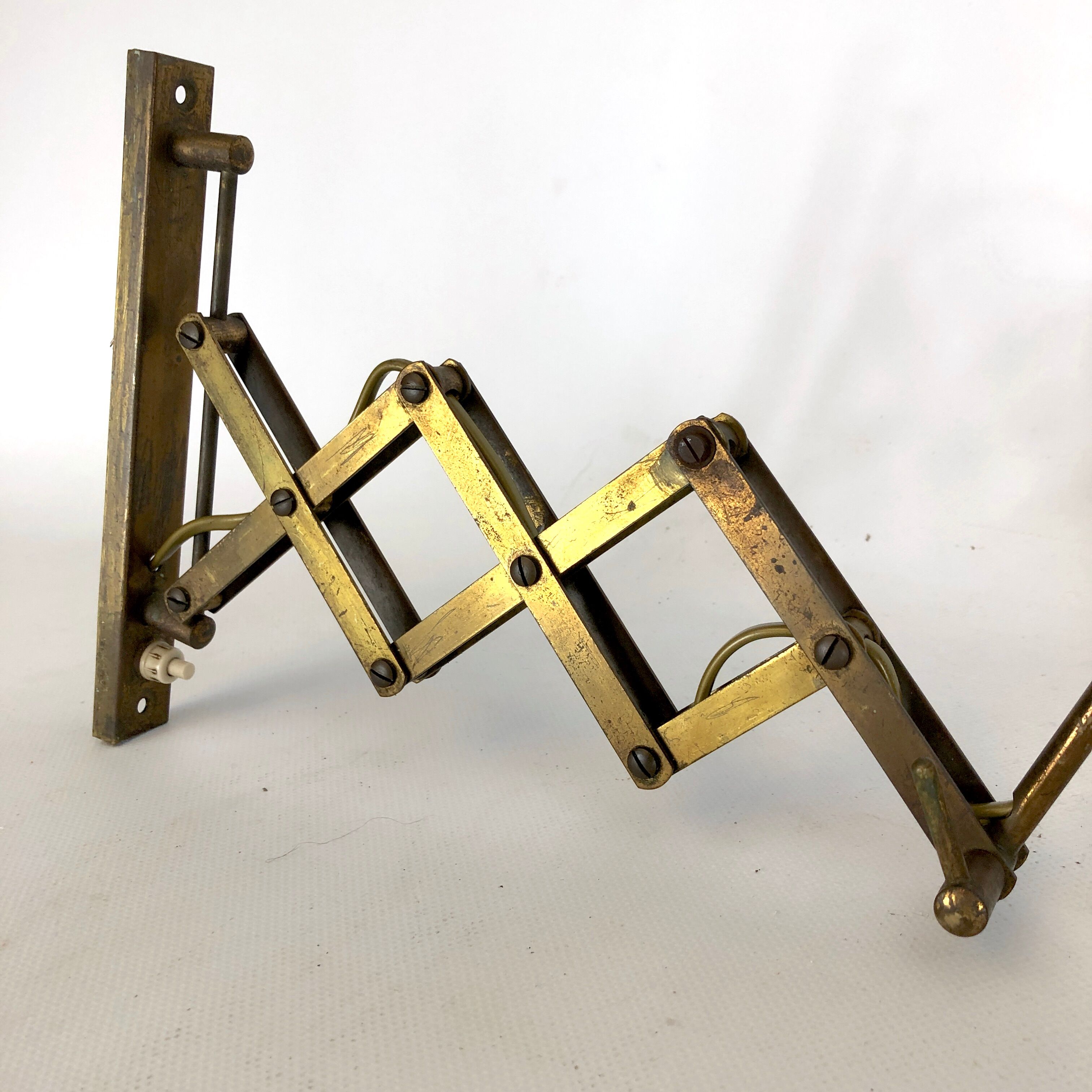 Mid century brass scissor wall lamp from 50s