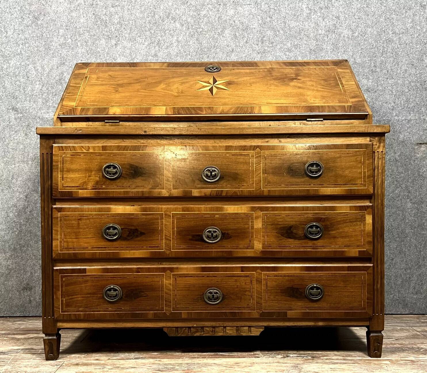 Louis XVI period chest of drawers in burr walnut with marquetry decoration
