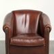 Sheepskin club armchair in English style with brown colour scheme