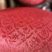 Napoleon III medallion armchair in carved wood and red velvet.