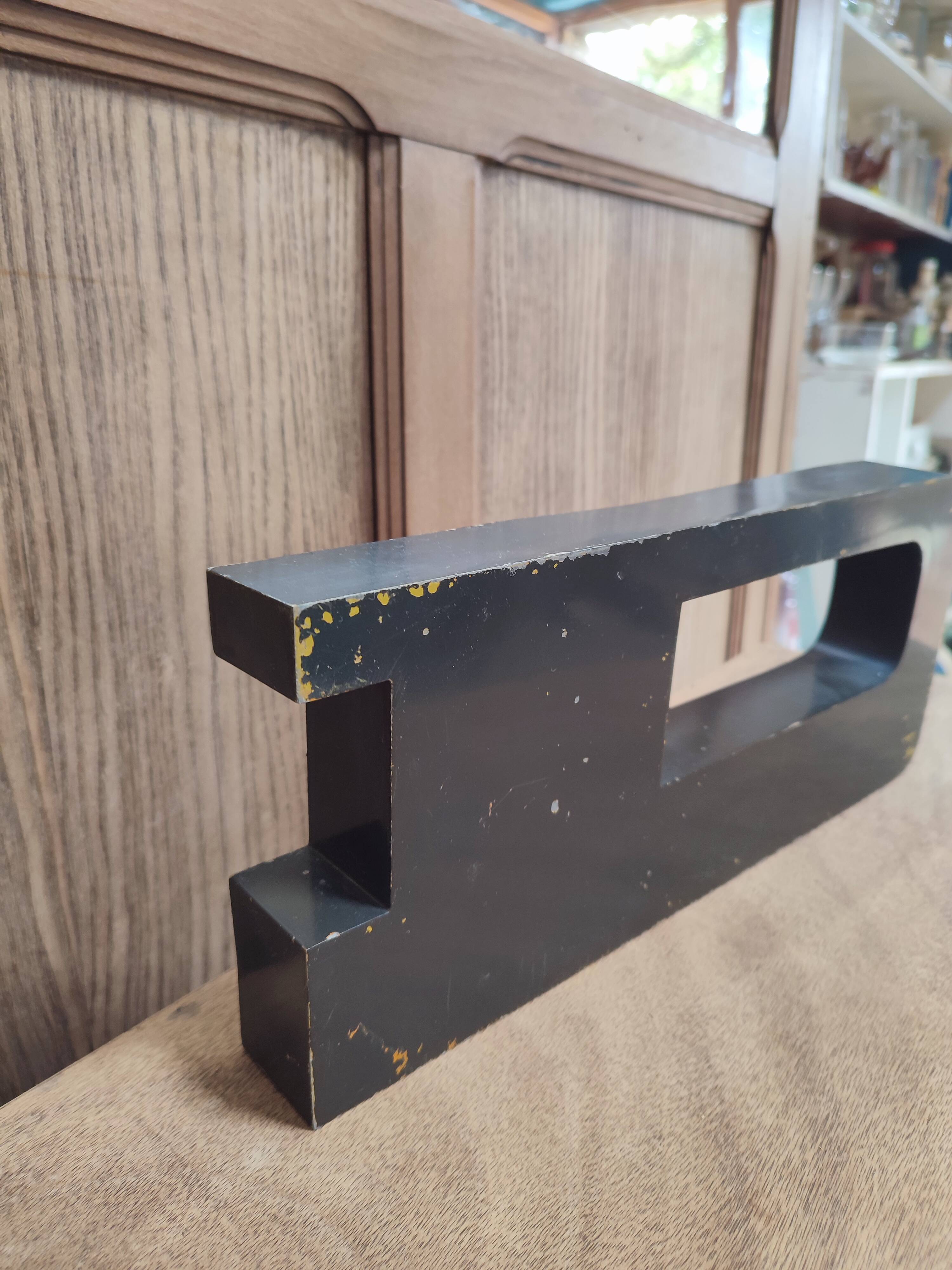 Vintage sign letter D